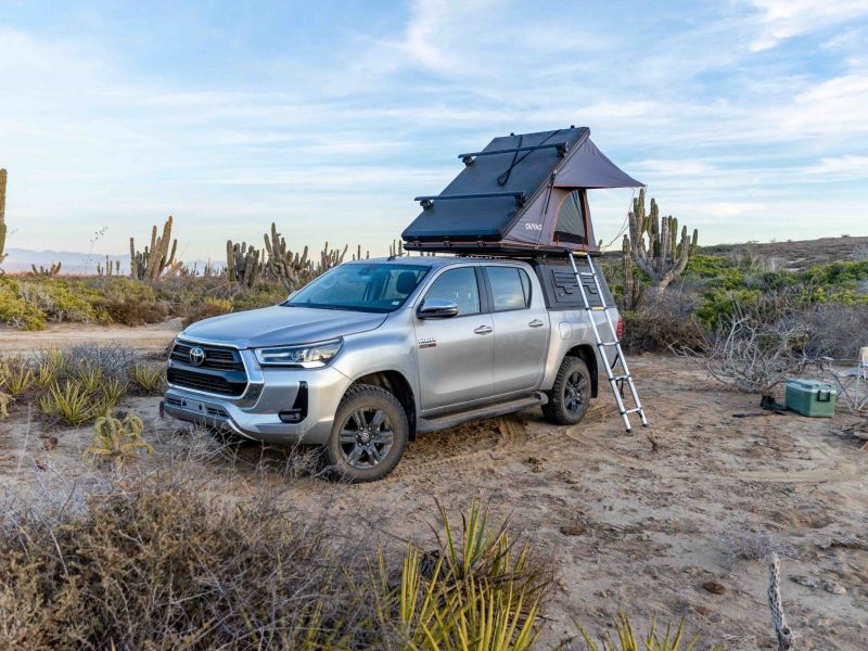 Photo of two women sightseeing and overlanding in the Baja California desert.